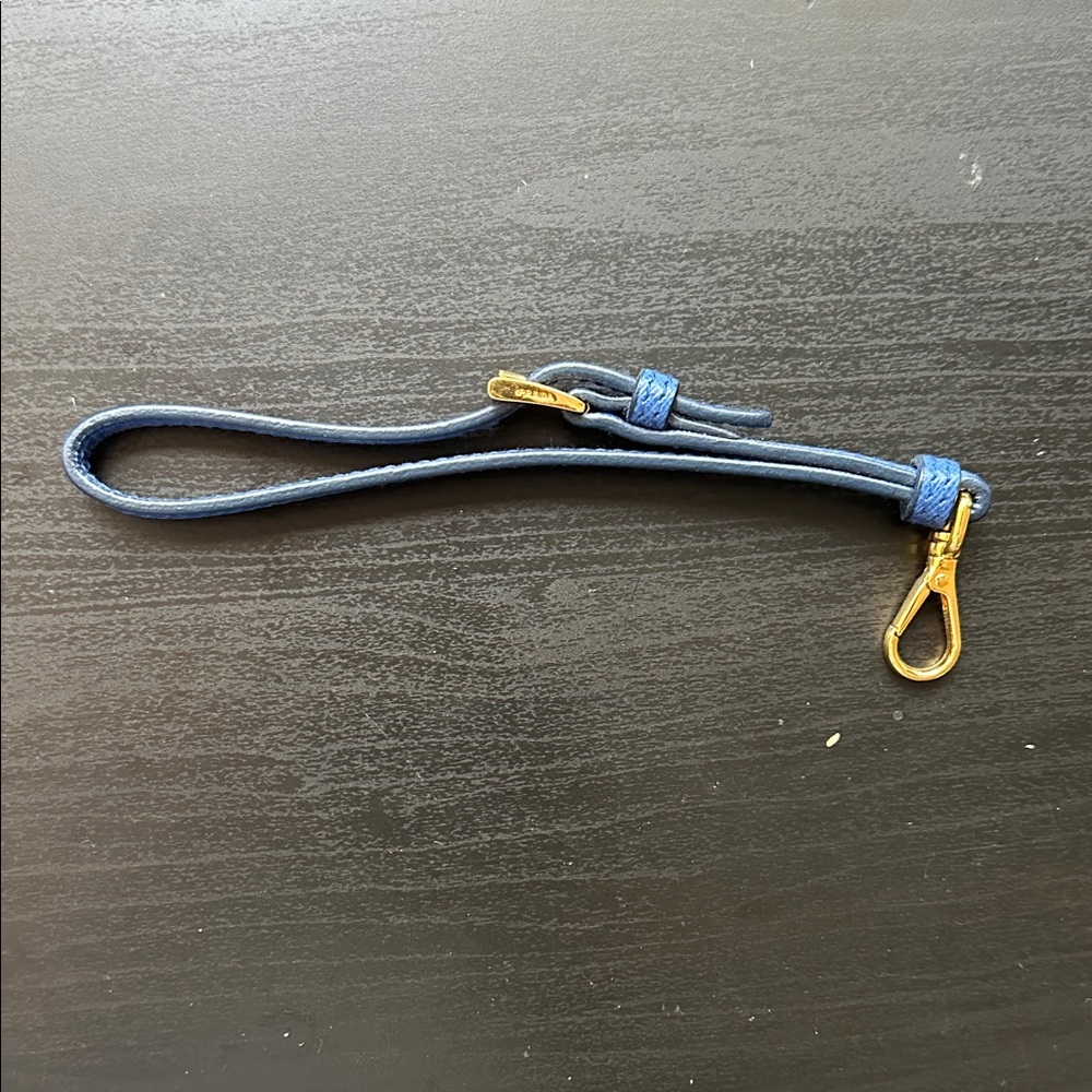 Prada Blue Leather Wrist Strap with Gold Clasp